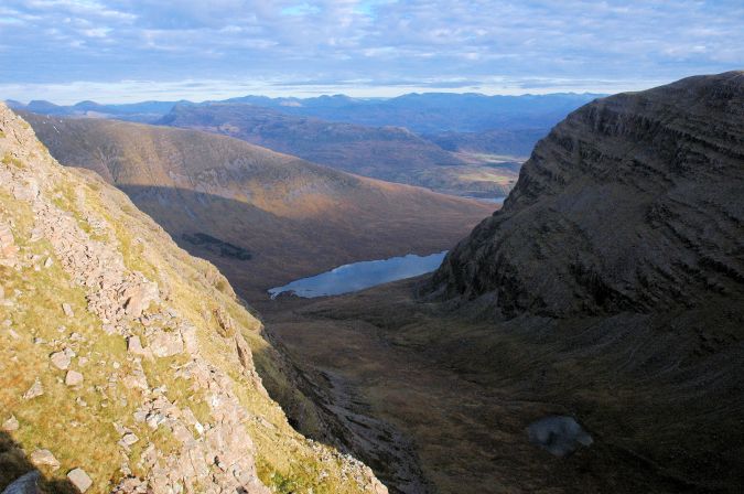 For those who are energetic enough to the walk up the steep track which leads from the road to the TV relay station, the reward is some even more magnificent views, especially if one ventures out across the open mountain top. Here we can see a dramatic view down towards Kishorn as seen from the Applecross tops.