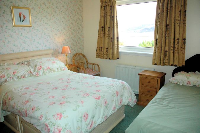 The family bedroom has a double bed as well as a single bed and will accommodate up to 3 people.