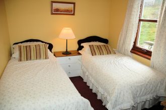 Click here for more information about the twin bedroom with photos.