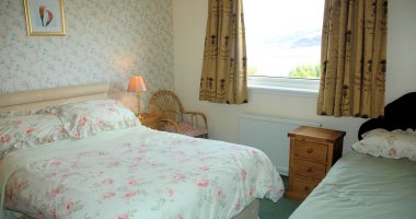 Strathardle has 3 bedrooms, including a family room, and will sleep up to 7 people.