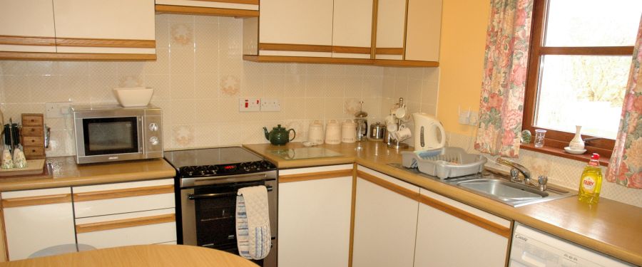 #image7 There is a well equipped kitchen in Tarlogie with a dining table and excellent views from the window.